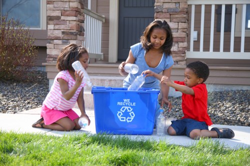 Community members donating furniture for recycling